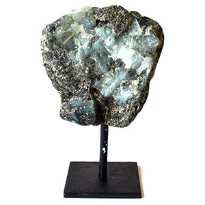 Emerald on black stand